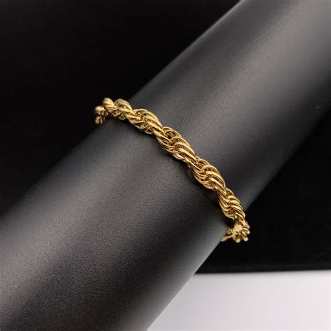 givenchy twisted gold tone bracelet|buy givenchy bracelet online.